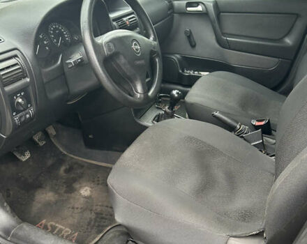 Черный Опель Астра, объемом двигателя 1.36 л и пробегом 193 тыс. км за 3700 $, фото 7 на Automoto.ua