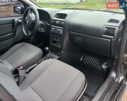 Черный Опель Астра, объемом двигателя 1.4 л и пробегом 230 тыс. км за 4500 $, фото 14 на Automoto.ua
