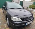 Черный Опель Астра, объемом двигателя 1.4 л и пробегом 157 тыс. км за 3850 $, фото 2 на Automoto.ua