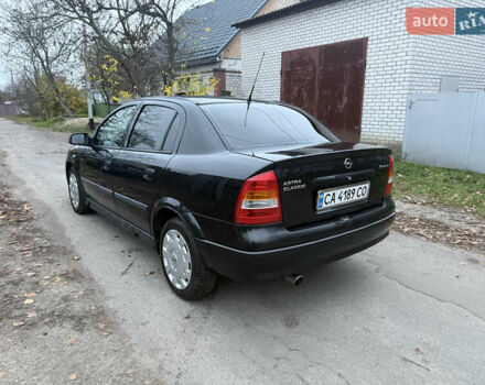 Чорний Опель Астра, об'ємом двигуна 1.6 л та пробігом 250 тис. км за 3650 $, фото 5 на Automoto.ua