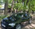 Черный Опель Астра, объемом двигателя 1.6 л и пробегом 470 тыс. км за 3000 $, фото 2 на Automoto.ua
