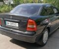 Черный Опель Астра, объемом двигателя 1.4 л и пробегом 243 тыс. км за 3500 $, фото 1 на Automoto.ua