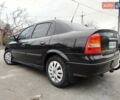 Черный Опель Астра, объемом двигателя 1.4 л и пробегом 220 тыс. км за 3999 $, фото 1 на Automoto.ua