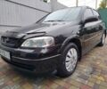 Черный Опель Астра, объемом двигателя 1.4 л и пробегом 157 тыс. км за 3850 $, фото 6 на Automoto.ua