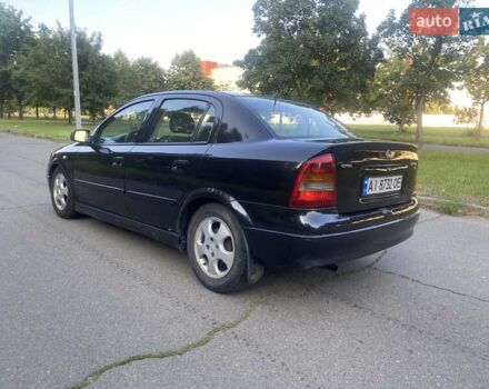 Черный Опель Астра, объемом двигателя 1.7 л и пробегом 300 тыс. км за 2400 $, фото 4 на Automoto.ua