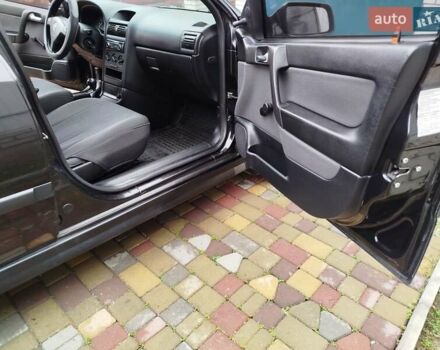 Черный Опель Астра, объемом двигателя 1.36 л и пробегом 160 тыс. км за 3850 $, фото 18 на Automoto.ua