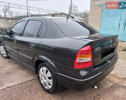 Черный Опель Астра, объемом двигателя 1.4 л и пробегом 230 тыс. км за 4500 $, фото 3 на Automoto.ua