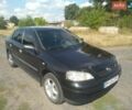 Чорний Опель Астра, об'ємом двигуна 1.4 л та пробігом 210 тис. км за 3600 $, фото 1 на Automoto.ua