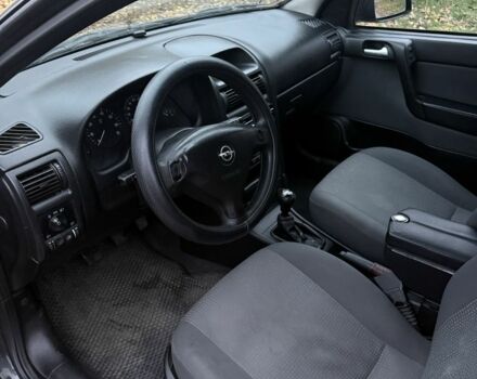 Черный Опель Астра, объемом двигателя 1.6 л и пробегом 250 тыс. км за 3750 $, фото 15 на Automoto.ua