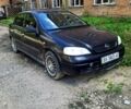Черный Опель Астра, объемом двигателя 1.4 л и пробегом 300 тыс. км за 1300 $, фото 1 на Automoto.ua