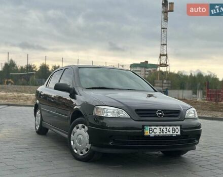 Черный Опель Астра, объемом двигателя 1.4 л и пробегом 216 тыс. км за 3999 $, фото 1 на Automoto.ua