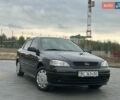 Черный Опель Астра, объемом двигателя 1.4 л и пробегом 216 тыс. км за 3999 $, фото 1 на Automoto.ua