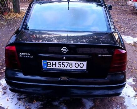Черный Опель Астра, объемом двигателя 1.6 л и пробегом 256 тыс. км за 3300 $, фото 2 на Automoto.ua