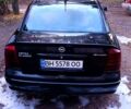 Черный Опель Астра, объемом двигателя 1.6 л и пробегом 256 тыс. км за 3300 $, фото 2 на Automoto.ua