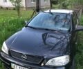 Чорний Опель Астра, об'ємом двигуна 1.4 л та пробігом 124 тис. км за 3299 $, фото 1 на Automoto.ua