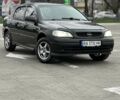 Чорний Опель Астра, об'ємом двигуна 1.38 л та пробігом 320 тис. км за 2900 $, фото 1 на Automoto.ua