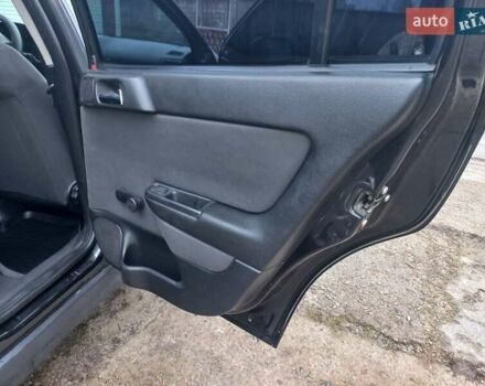 Черный Опель Астра, объемом двигателя 1.4 л и пробегом 230 тыс. км за 4500 $, фото 20 на Automoto.ua