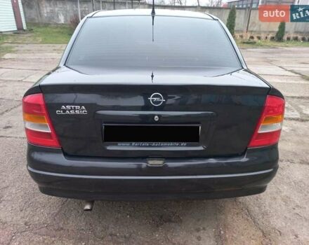 Черный Опель Астра, объемом двигателя 1.4 л и пробегом 230 тыс. км за 4500 $, фото 6 на Automoto.ua