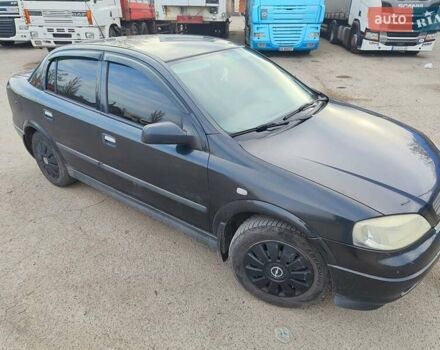 Черный Опель Астра, объемом двигателя 1.39 л и пробегом 231 тыс. км за 4200 $, фото 1 на Automoto.ua