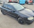 Черный Опель Астра, объемом двигателя 1.39 л и пробегом 235 тыс. км за 2700 $, фото 1 на Automoto.ua