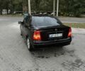 Черный Опель Астра, объемом двигателя 1.4 л и пробегом 130 тыс. км за 3500 $, фото 1 на Automoto.ua