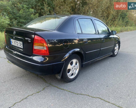 Черный Опель Астра, объемом двигателя 1.7 л и пробегом 300 тыс. км за 2400 $, фото 6 на Automoto.ua