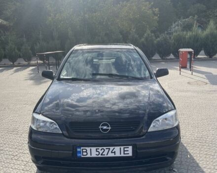 Черный Опель Астра, объемом двигателя 1.4 л и пробегом 212 тыс. км за 3650 $, фото 2 на Automoto.ua