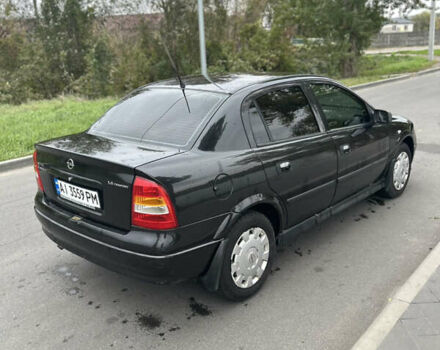 Черный Опель Астра, объемом двигателя 1.36 л и пробегом 193 тыс. км за 3700 $, фото 4 на Automoto.ua