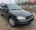 Черный Опель Астра, объемом двигателя 1.4 л и пробегом 230 тыс. км за 4500 $, фото 1 на Automoto.ua