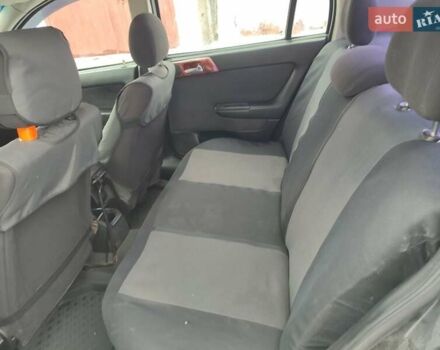 Черный Опель Астра, объемом двигателя 1.36 л и пробегом 300 тыс. км за 2150 $, фото 8 на Automoto.ua