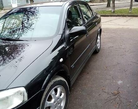 Черный Опель Астра, объемом двигателя 1.4 л и пробегом 155 тыс. км за 3700 $, фото 13 на Automoto.ua