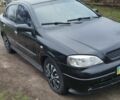 Черный Опель Астра, объемом двигателя 1.6 л и пробегом 200 тыс. км за 3700 $, фото 1 на Automoto.ua