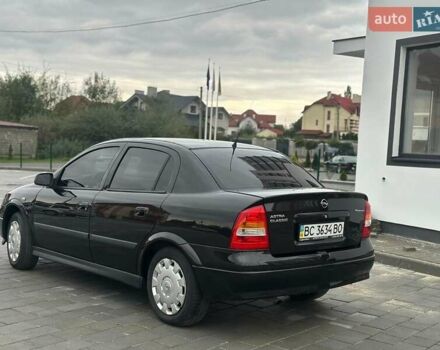 Черный Опель Астра, объемом двигателя 1.4 л и пробегом 216 тыс. км за 3999 $, фото 8 на Automoto.ua
