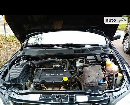 Черный Опель Астра, объемом двигателя 1.4 л и пробегом 155 тыс. км за 3500 $, фото 7 на Automoto.ua