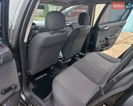 Черный Опель Астра, объемом двигателя 1.4 л и пробегом 230 тыс. км за 4500 $, фото 16 на Automoto.ua