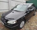 Черный Опель Астра, объемом двигателя 1.4 л и пробегом 157 тыс. км за 3850 $, фото 5 на Automoto.ua