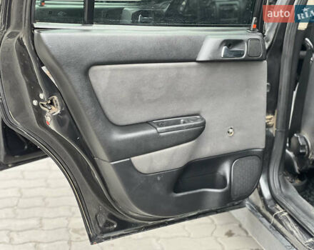 Черный Опель Астра, объемом двигателя 1.4 л и пробегом 157 тыс. км за 2500 $, фото 10 на Automoto.ua