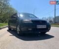 Черный Опель Астра, объемом двигателя 1.4 л и пробегом 247 тыс. км за 3300 $, фото 1 на Automoto.ua
