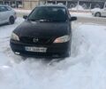 Черный Опель Астра, объемом двигателя 1.6 л и пробегом 231 тыс. км за 4000 $, фото 1 на Automoto.ua