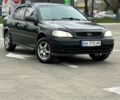 Черный Опель Астра, объемом двигателя 1.4 л и пробегом 320 тыс. км за 2900 $, фото 1 на Automoto.ua