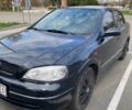 Черный Опель Астра, объемом двигателя 1.4 л и пробегом 293 тыс. км за 2900 $, фото 1 на Automoto.ua