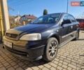 Черный Опель Астра, объемом двигателя 1.4 л и пробегом 266 тыс. км за 3200 $, фото 1 на Automoto.ua