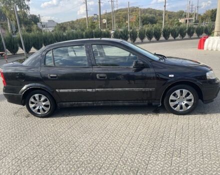 Черный Опель Астра, объемом двигателя 1.4 л и пробегом 212 тыс. км за 3650 $, фото 3 на Automoto.ua