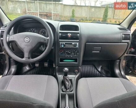 Черный Опель Астра, объемом двигателя 1.4 л и пробегом 230 тыс. км за 4500 $, фото 12 на Automoto.ua