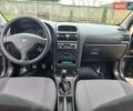 Черный Опель Астра, объемом двигателя 1.4 л и пробегом 230 тыс. км за 4500 $, фото 12 на Automoto.ua