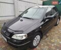 Черный Опель Астра, объемом двигателя 1.36 л и пробегом 160 тыс. км за 3850 $, фото 8 на Automoto.ua