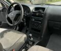 Черный Опель Астра, объемом двигателя 1.6 л и пробегом 283 тыс. км за 2905 $, фото 6 на Automoto.ua