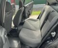 Черный Опель Астра, объемом двигателя 1.6 л и пробегом 283 тыс. км за 2905 $, фото 3 на Automoto.ua