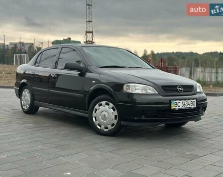 Черный Опель Астра, объемом двигателя 1.4 л и пробегом 216 тыс. км за 3999 $, фото 2 на Automoto.ua