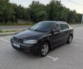 Черный Опель Астра, объемом двигателя 1.6 л и пробегом 215 тыс. км за 3900 $, фото 1 на Automoto.ua